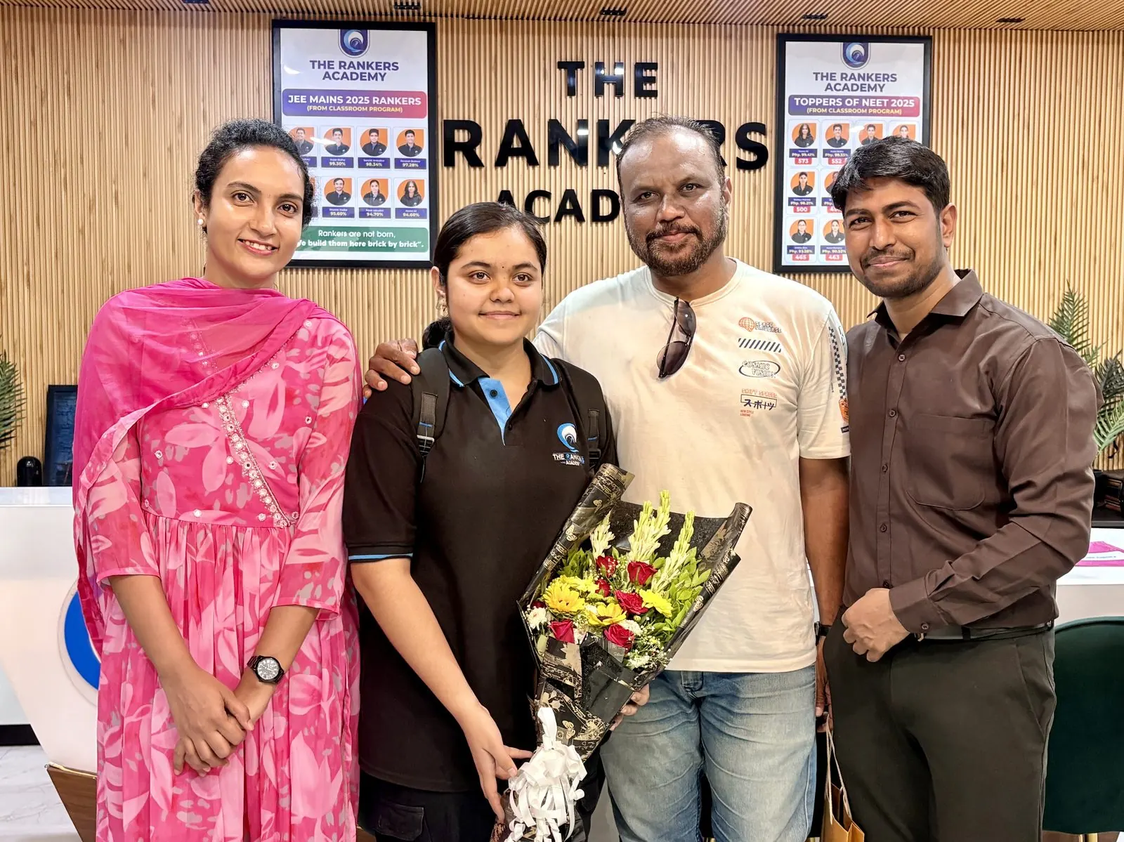 Group of faculty & students in a celebration moment