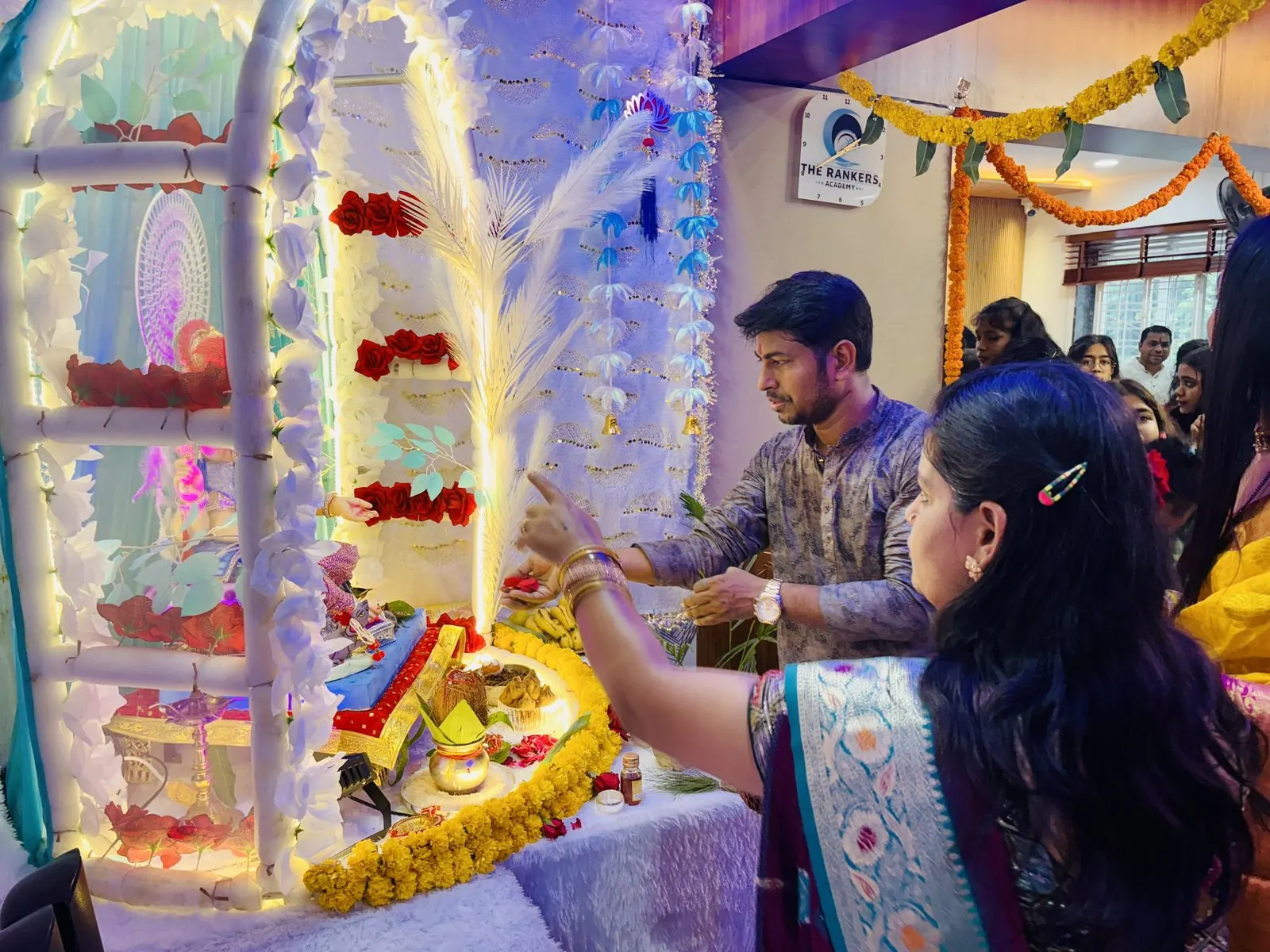 Ganesh Chaturthi decorated altar at the academy