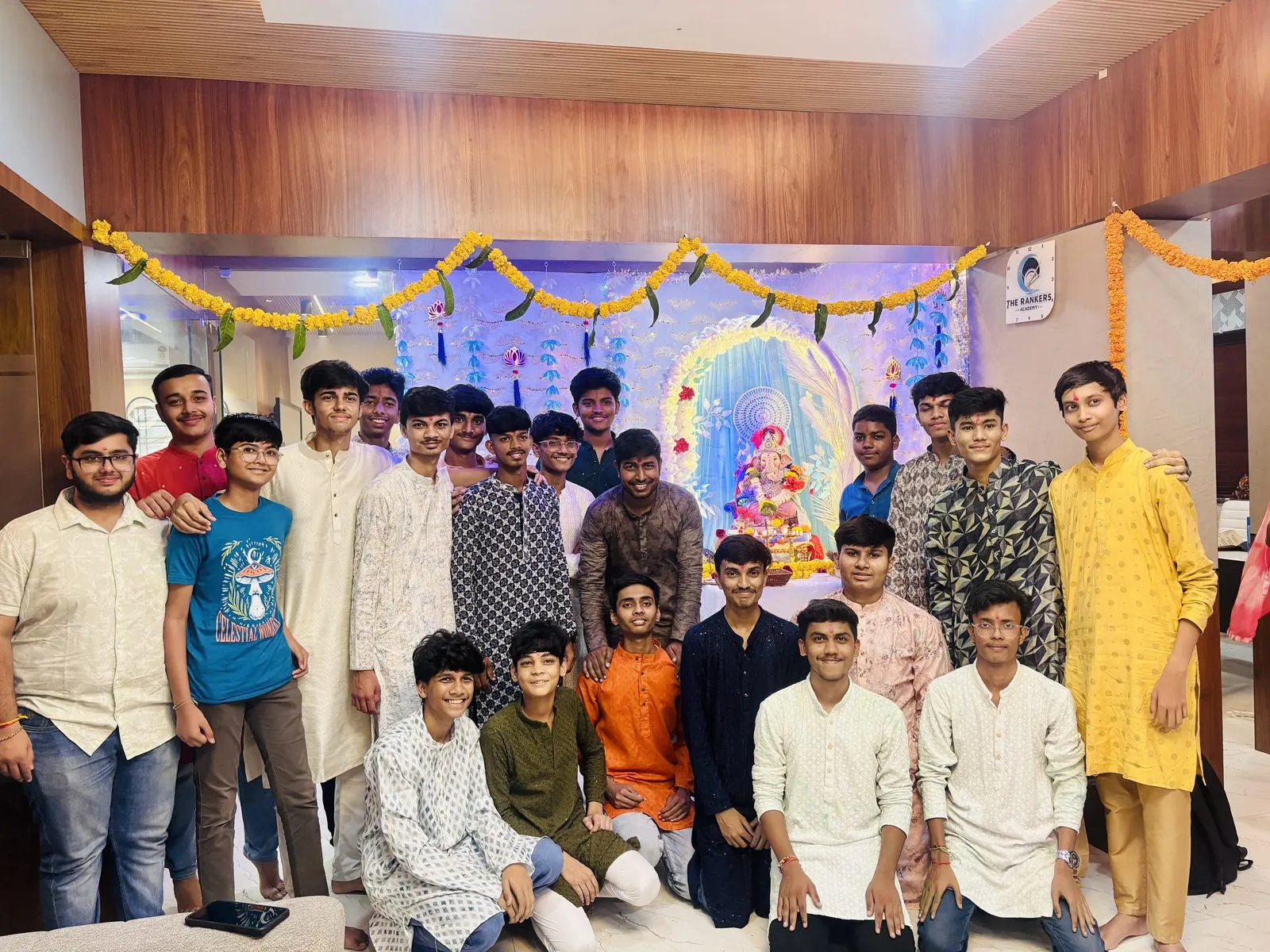 Faculty & students in traditional attire at the festival